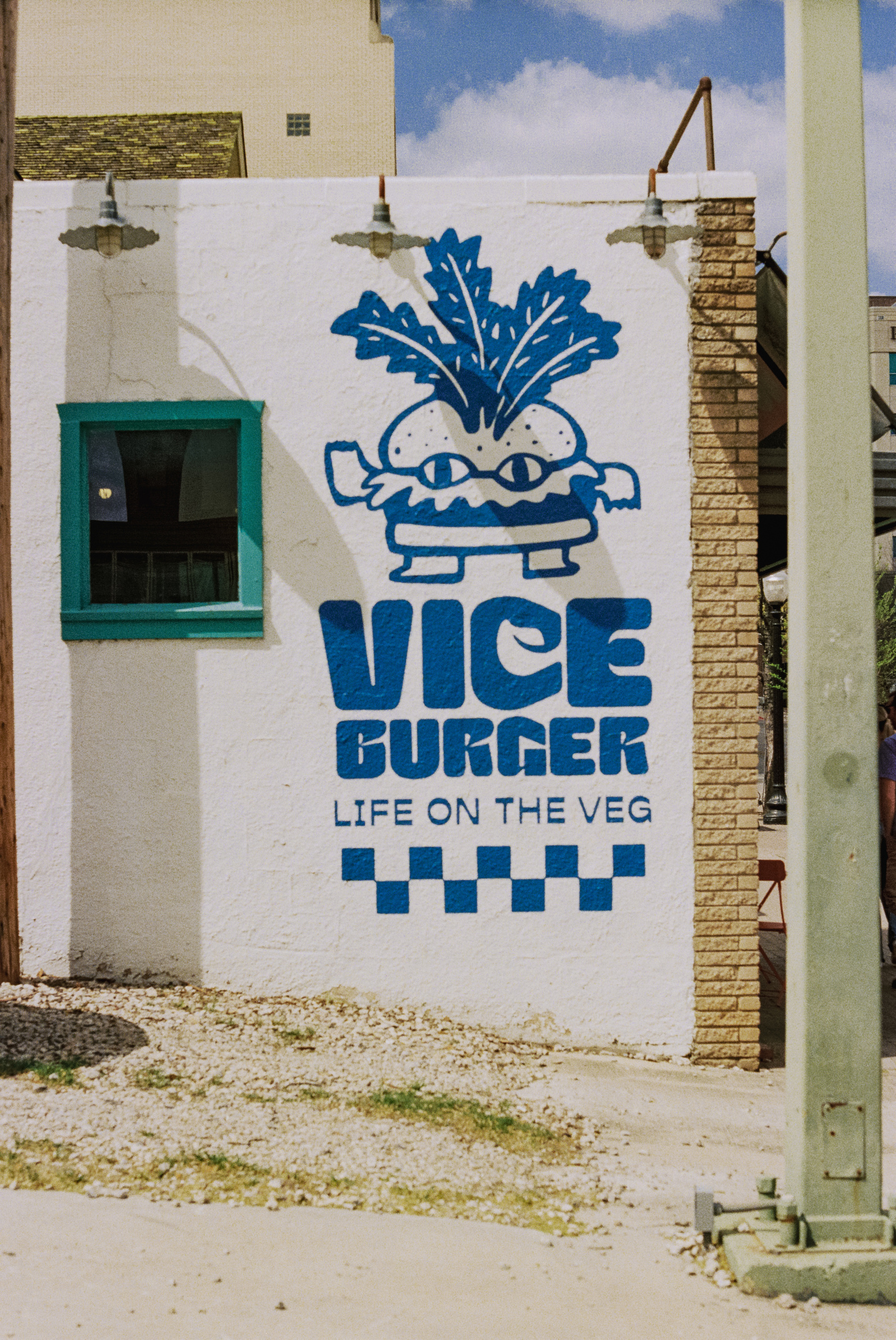 Bright and cheeky, this mural is a burst of joy and plant-based pride. Vice Burger’s wall art turns fast food into street art, where even veggies come with attitude.