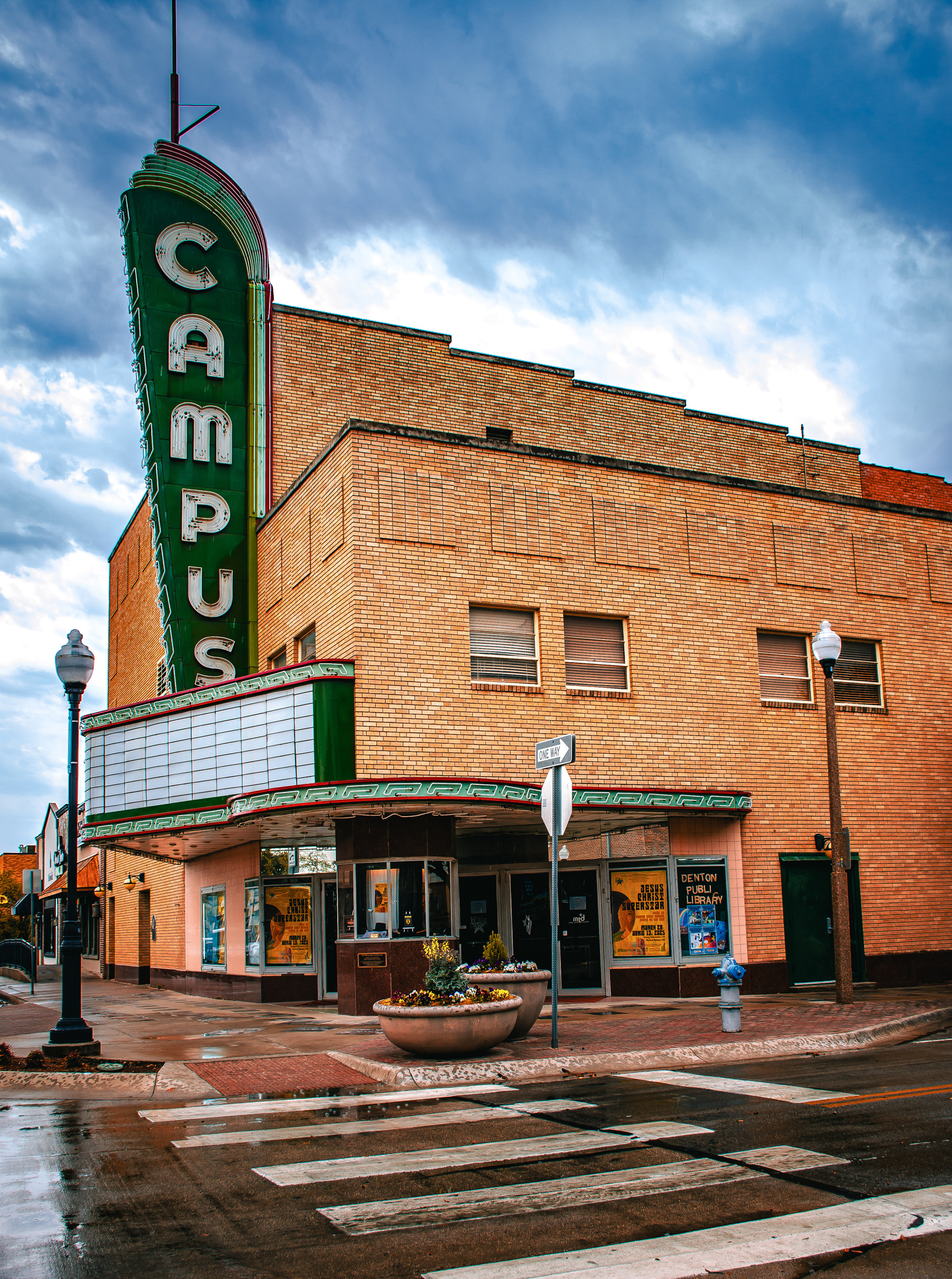 The Campus sign still beams bright, even if the reels aren't spinning. Nostalgia and neon refuse to fade quietly.