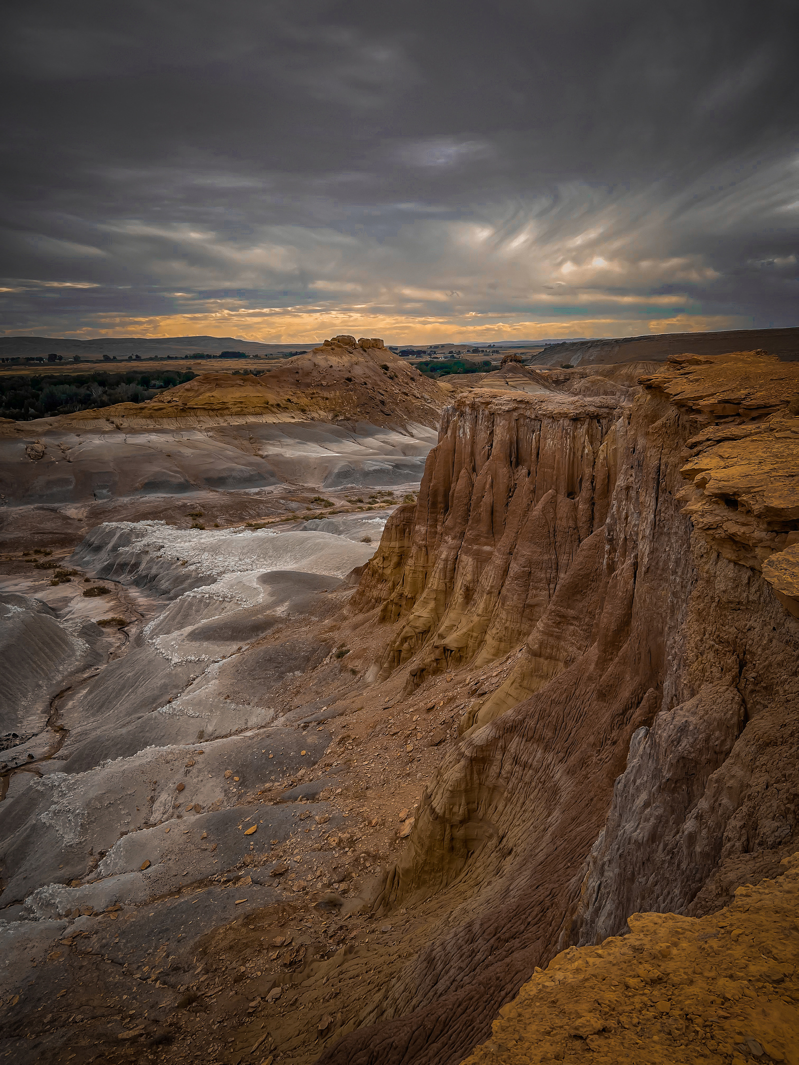 Precarious and unafraid, the land holds itself together by its own tension. A moment in balance.