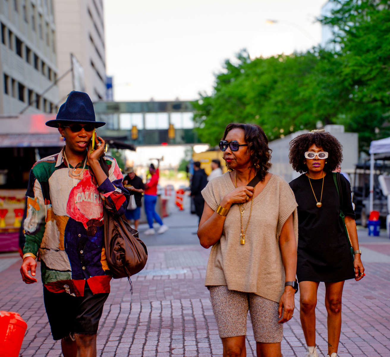Downtown heat, golden-hour stride, and three styles telling three stories. Movement and mood reflected in stride.